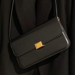 The curated black classic smooth bag (tag still attached)